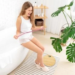 Relaxdays Personenweegschaal Bamboe - Bamboe Weegschaal - Tot 180 Kg - Rond - Kg & Lbs -Silvergear Shop 550x550 312